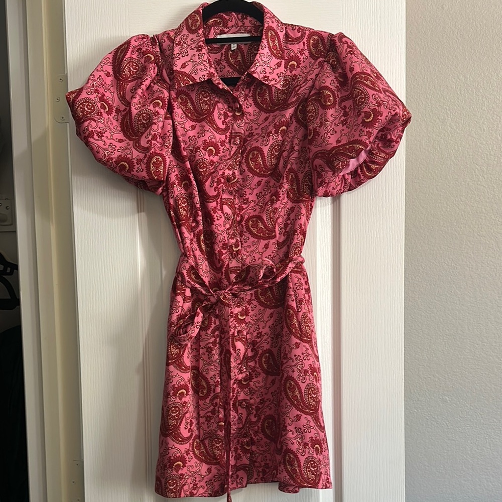 Likely pink paisley dress